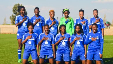 Photo of Kick4life female players receive contacts